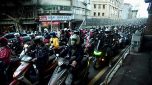 'Game changer' e-moped batteries spread from Taiwan across Asia