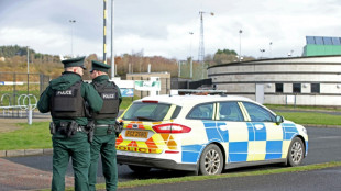 Three men arrested over N.Ireland police officer's shooting