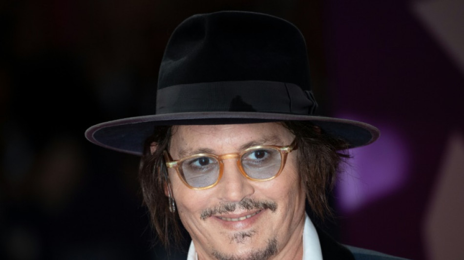 Johnny Depp makes comeback in scandal-hit period drama