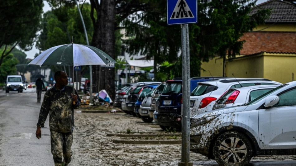 Italy flood death toll rises to 14 