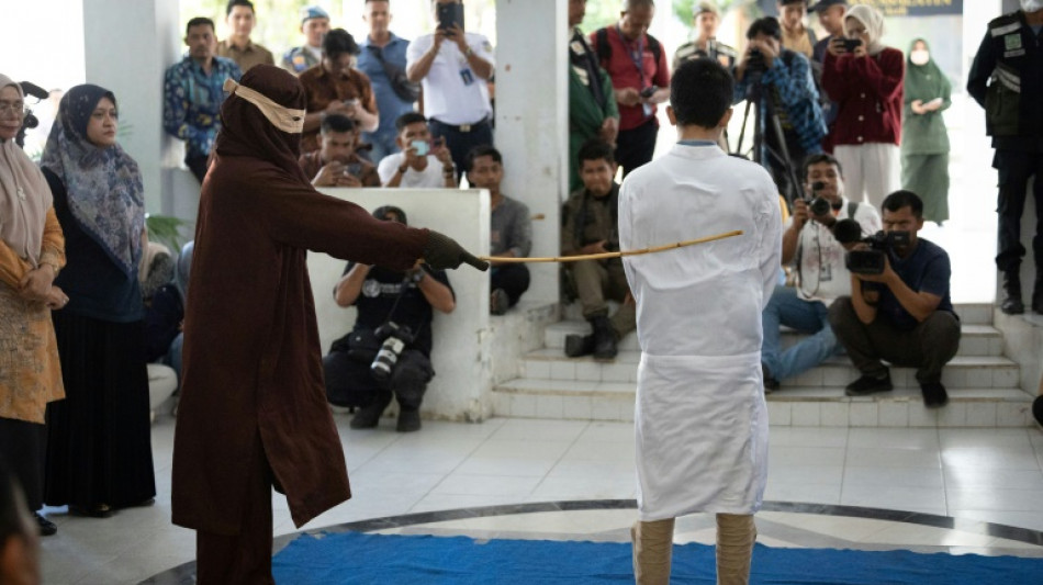 Two men publicly flogged in Indonesia for gay sex