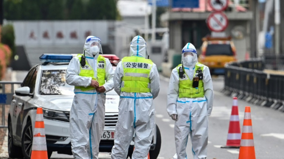 Anxiety and empty shelves as Shanghai Covid-19 cases surge