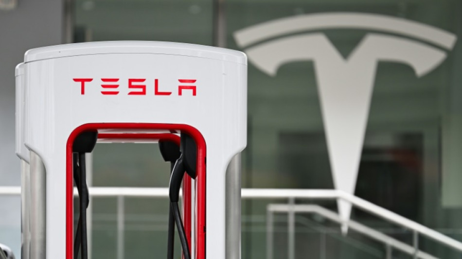 Tesla shares jump as profits rise on lower expenses