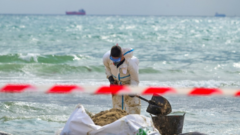 Spain cleans up after mystery substance closes three beaches