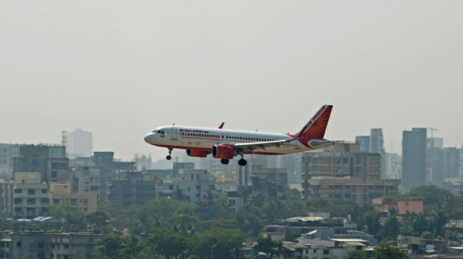 Police arrest Indian executive for urinating on plane passenger