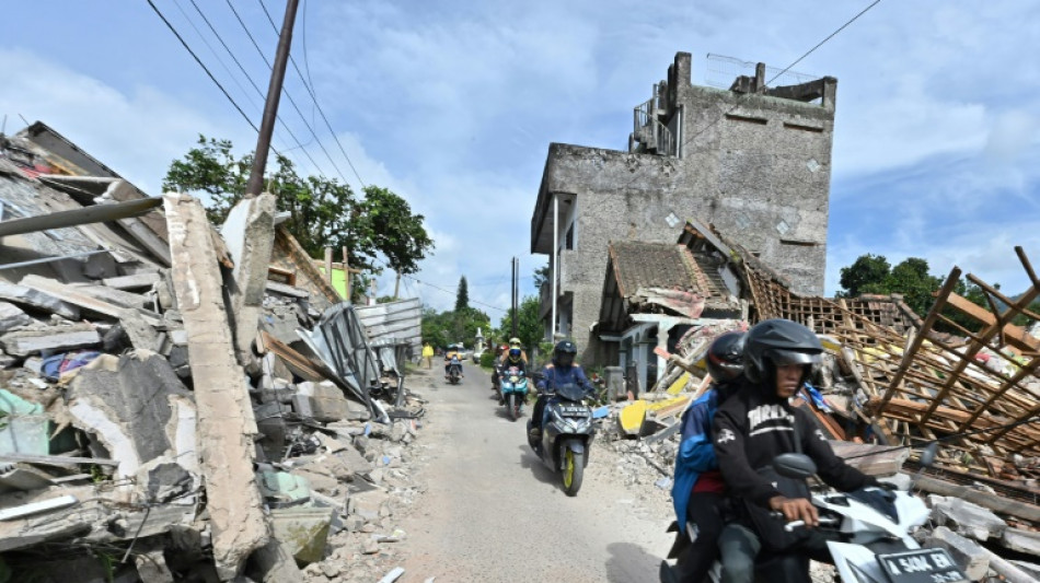 Indonesia quake survivors appeal for supplies as rain hampers rescue