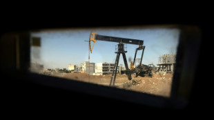 Oil prices extend gains on Mideast tensions, Wall Street slips 