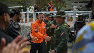 Dogs, drones and a happy ending for Venezuela's rescued 'fanatics'