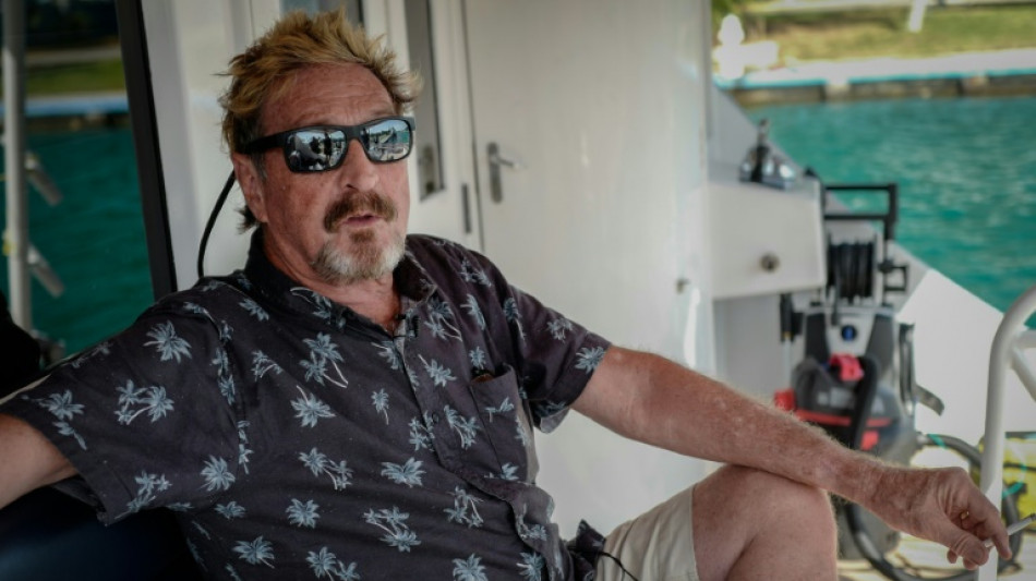 A year after death, McAfee's corpse still in Spanish morgue