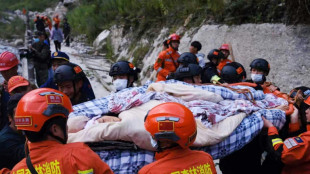 Rescuers search for survivors after dozens killed in China quake