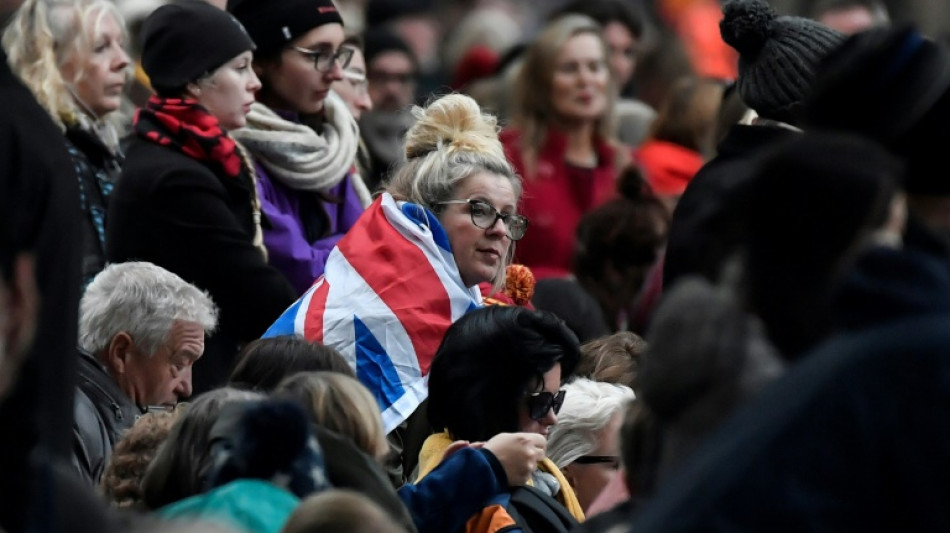 'Part of history': hushed crowds pack London for queen's funeral