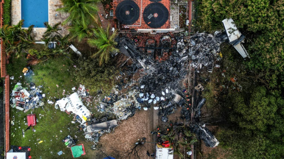 Workers begin recovering bodies from Brazil plane crash